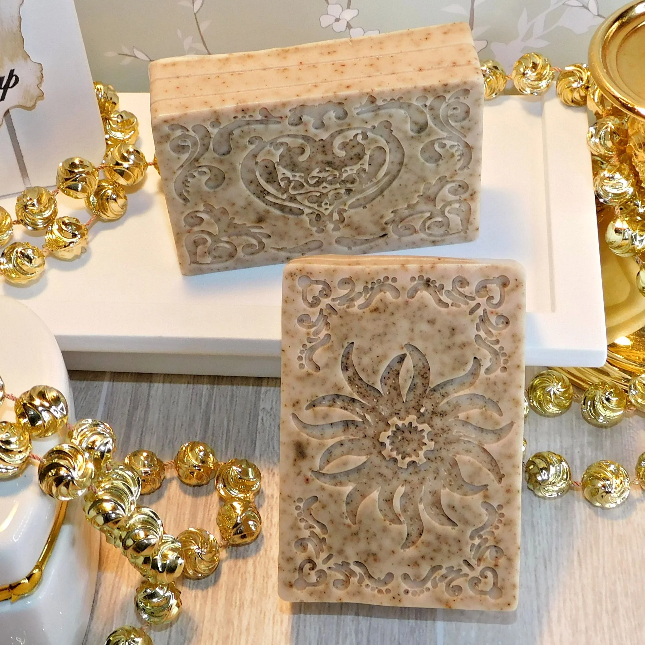 rectangular soap bars with designs stamped in the center