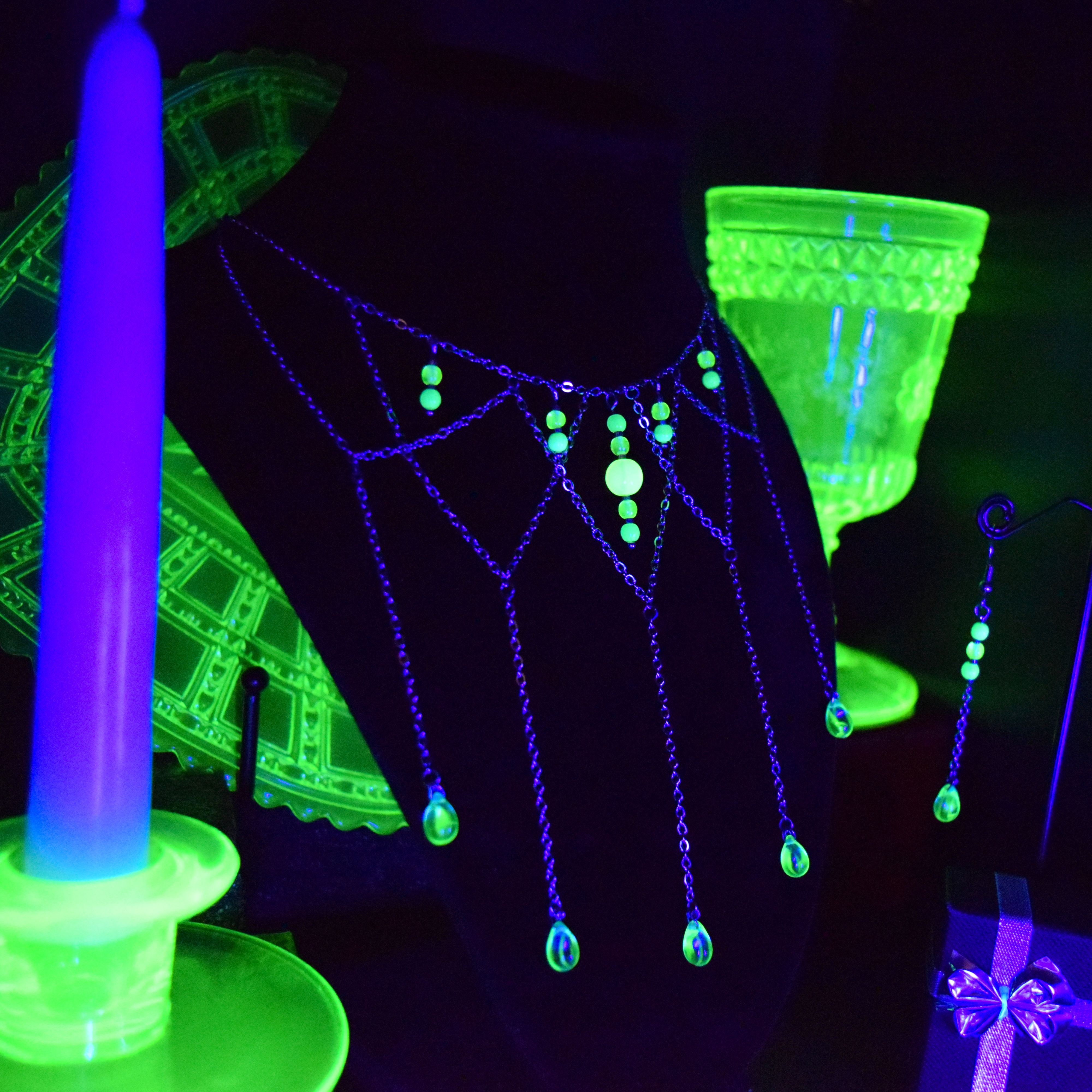 A glowing uranium jewelry set with anique uranium glass